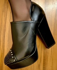 Scarpa stivaletto con tacco e